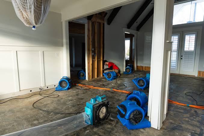 Water damage restoration equipment set up at a New Jersey property